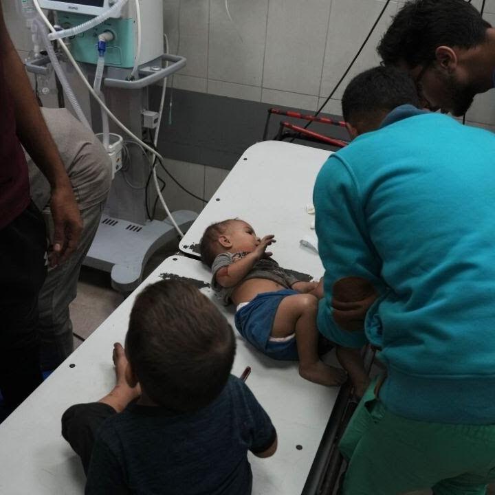 Children among those killed and injured by Israeli strikes arrive at Gaza hospital
